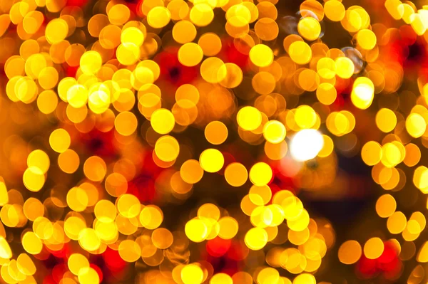 Des lumières de Noël scintillantes en or. Fond abstrait flou — Photo