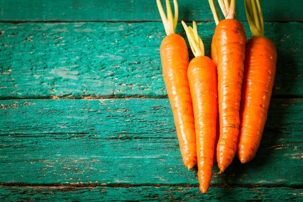 Fresh carrots on wooden table , diet concept — Stock Photo, Image