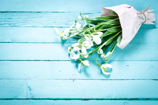 Easter concept with  snowdrops on wooden background — Stock Photo, Image