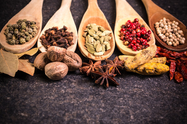 spices and herbs on wooden table , medicinal concept