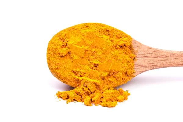 Mucchio di curcuma macinata su sfondo bianco — Foto Stock