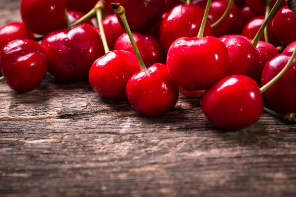 Fresh cherry on wooden table healthy food 