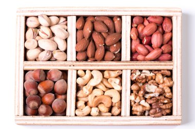 Ahşap masa, sağlıklı vegan fındık gıda mix.