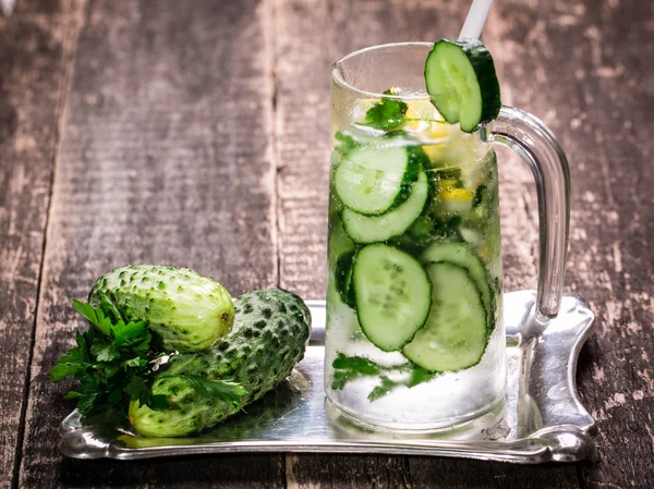 Fresh cold cucumber drink on wooden table — Stock Photo, Image