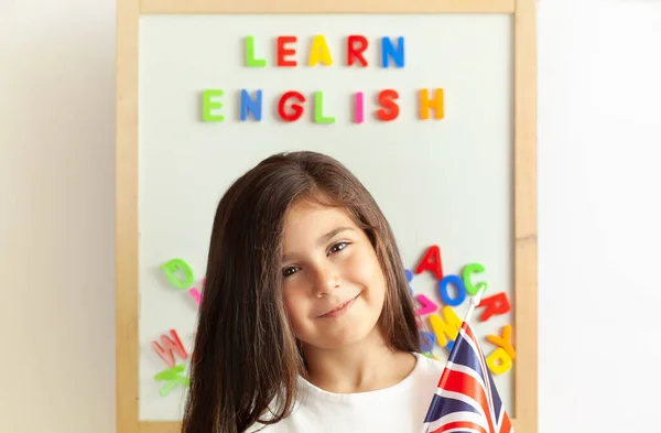Cheerful Little Girl Portrait Education Concept 로열티 프리 스톡 이미지