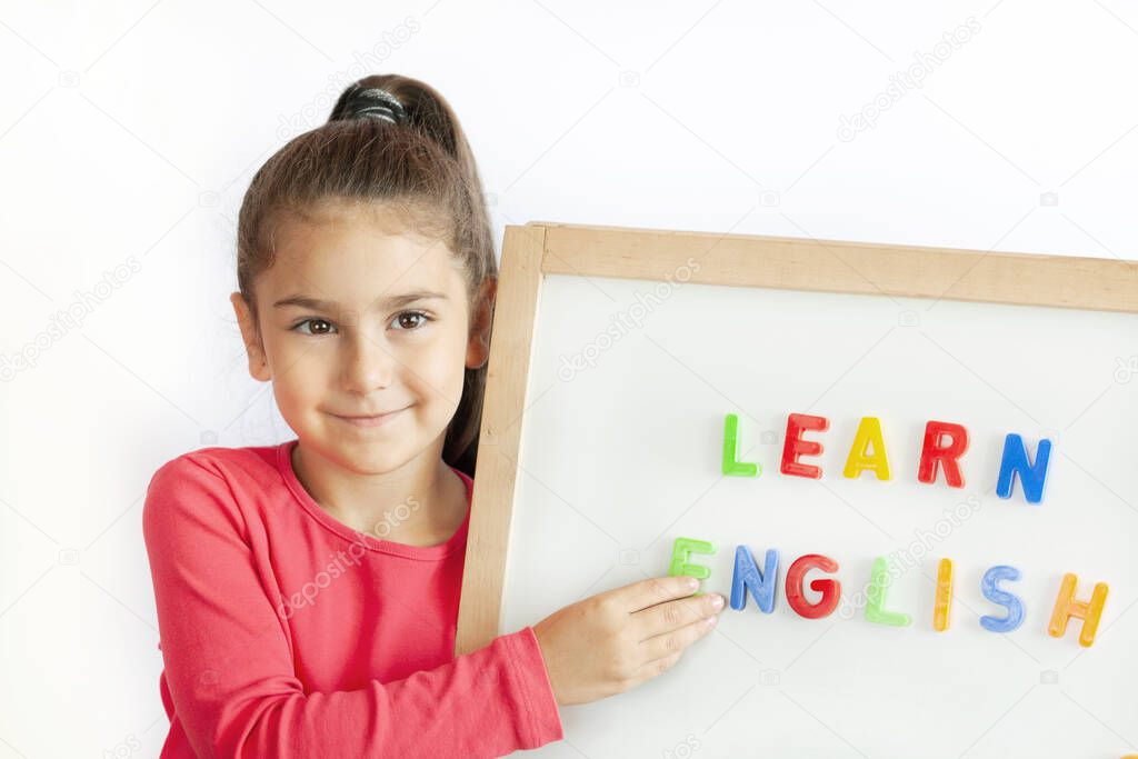 happy cute girl portrait, english language education concept 