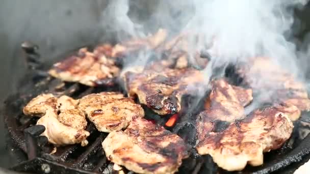 Steaks on barbecue grill — Stock Video