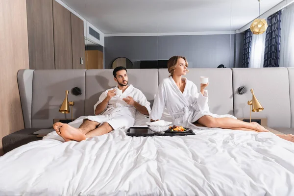 Young Woman Holding Cup Breakfast Muslim Boyfriend Hotel Bed — Stock Photo, Image