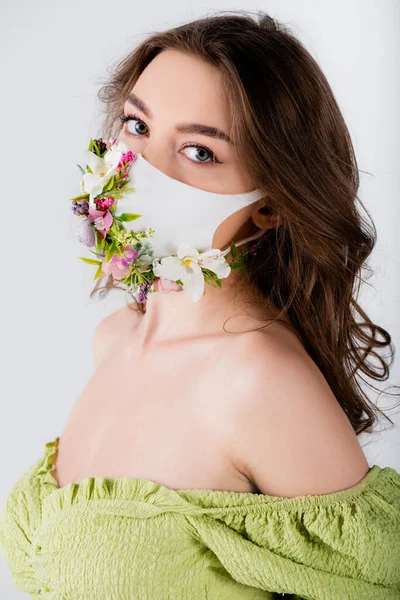 Brunette Woman Trendy Blouse Medical Mask Flowers Looking Camera Isolated — Stock Photo, Image