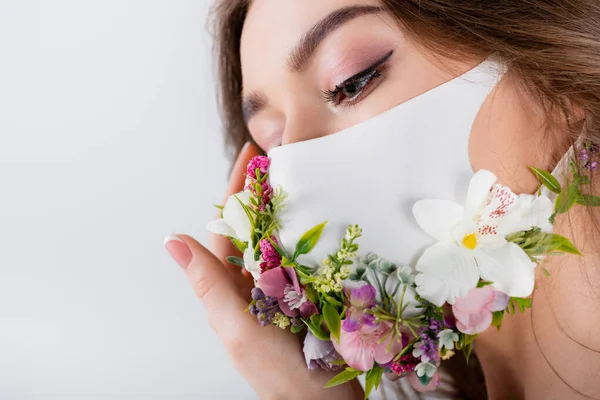 Portrait Young Woman Holding Hand Medical Mask Flowers Isolated Grey — Stock Photo, Image