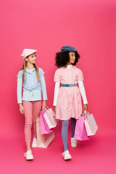 Fashionable Interracial Girls Walking Shopping Bags Pink — Stock Photo, Image