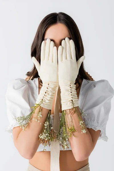 Young Woman Covering Face Hands Gloves Flowers Isolated White — Stock Photo, Image
