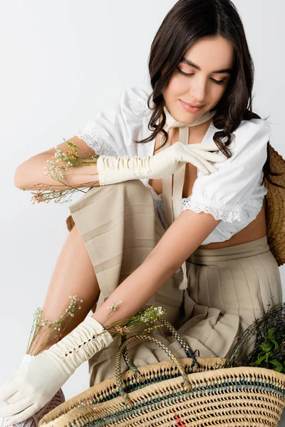 Smiling Woman Spring Outfit Gloves Flowers Sitting While Posing Isolated — Stock Photo, Image