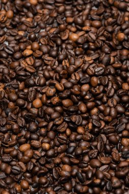 top view of fresh and brown coffee beans clipart