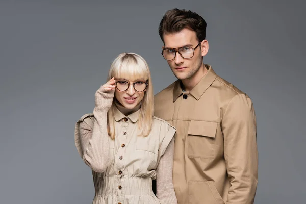 Stylish Model Adjusting Glasses Posing Man Isolated Grey — Stock Photo, Image