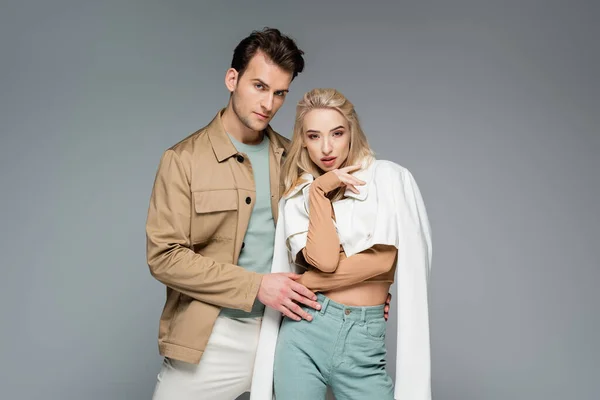 Stylish Couple Jackets Posing Isolated Grey — Stock Photo, Image