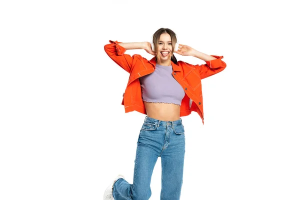 Cheerful Woman Sticking Out Tongue While Listening Music Wireless Headphones — Stock Photo, Image