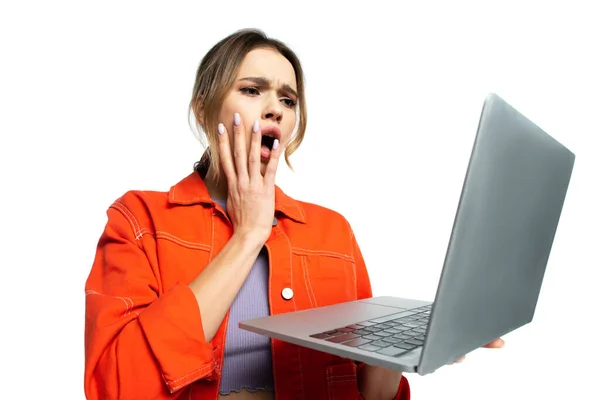 Shocked Young Woman Orange Shirt Looking Laptop Isolated White Stock Picture