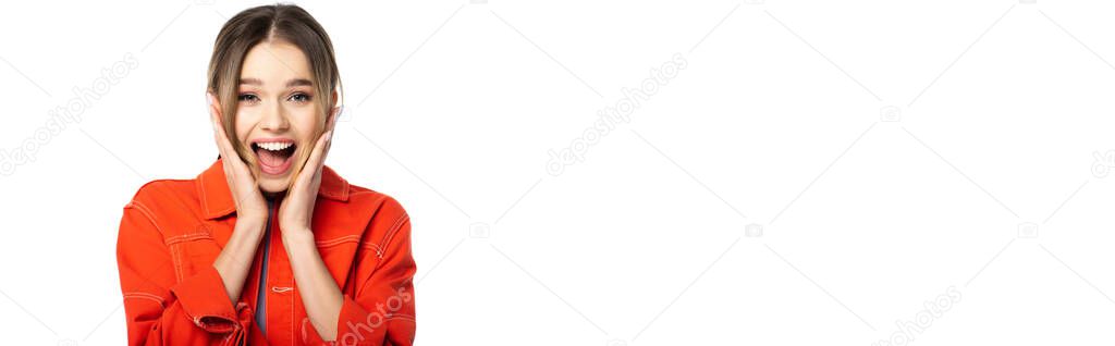 amazed woman with open mouth in orange shirt isolated on white, banner