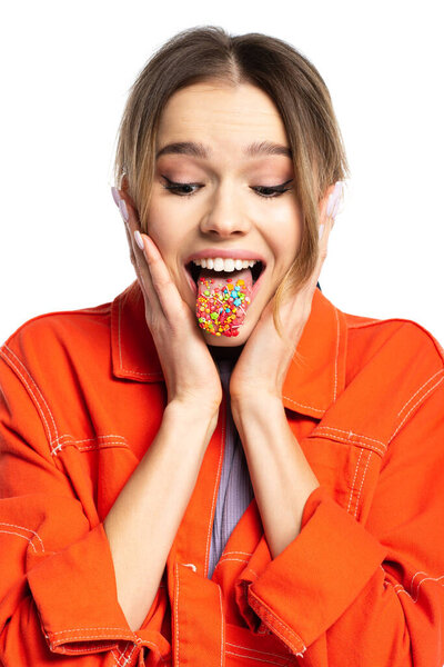 young woman sticking out tongue with tasty sprinkles isolated on white 
