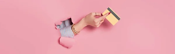 Cropped View Young Woman Holding Credit Card Pink Background Hole — Stock Photo, Image