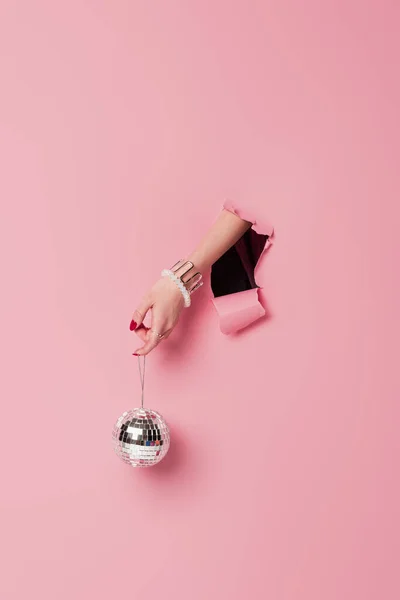 Cropped View Woman Bracelets Holding Disco Ball Pink Background Hole — Stock Photo, Image