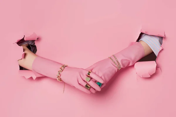 Cropped View Woman Rings Bracelets Gloves Pink Background Holes — Stock Photo, Image