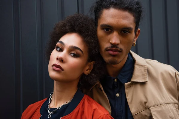 African American Man Looking Camera While Posing Young Curly Woman — Stock Photo, Image