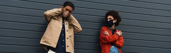 Young African American Couple Stylish Protective Masks Posing Banner — Stock Photo, Image