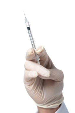 Cropped view of hand of doctor in latex glove holding syringe isolated on white  clipart