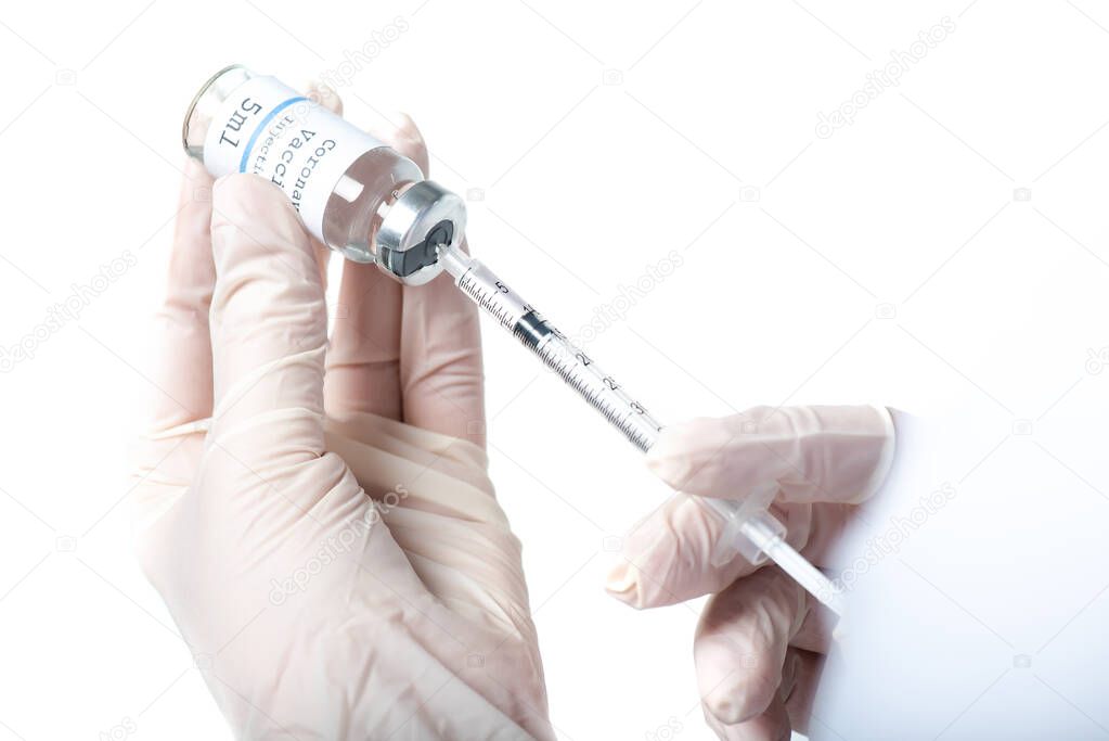 Cropped view of doctor picking up vaccine in syringe isolated on white 