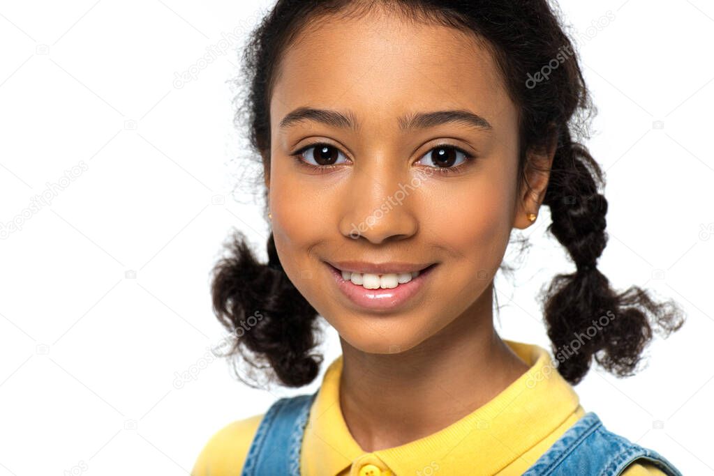 Smiling african american child looking at camera isolated on white 