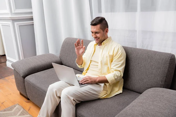 Cheerful Man Waving Hand Video Call Laptop Home — Stock Photo, Image
