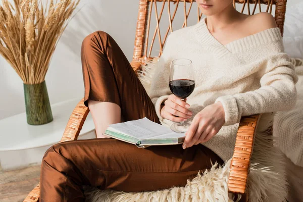 Cropped View Young Woman Sitting Rocking Chair Book Glass Wine — Stock Photo, Image