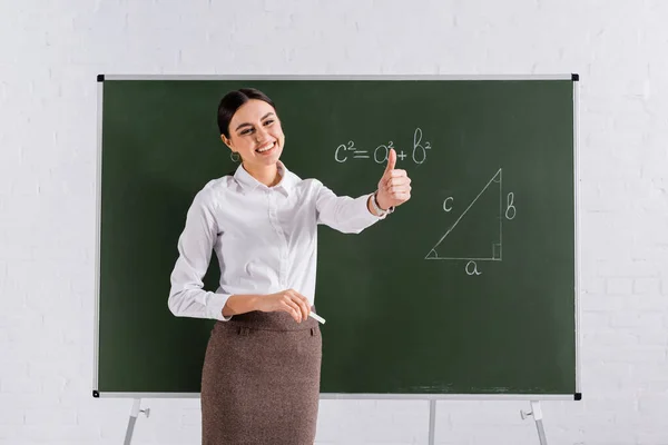 Smiling Teacher Chalk Showing Chalkboard Equation — Stock Photo, Image