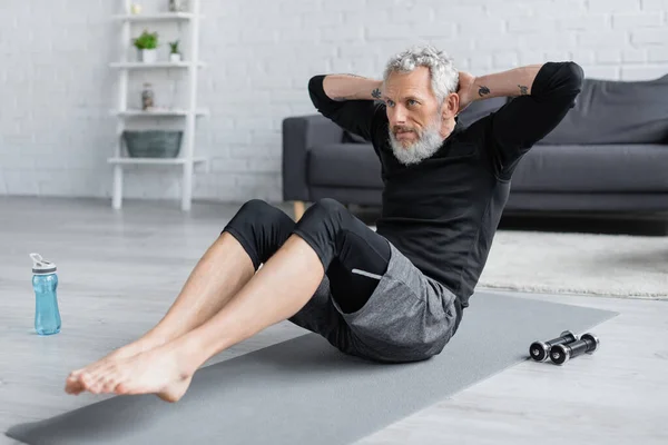 Bearded Barefoot Man Working Out Fitness Mat Living Room — Stock Photo, Image