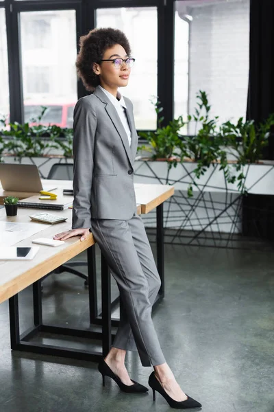 Young African American Manager Standing Gadgets Table — Stock Photo, Image