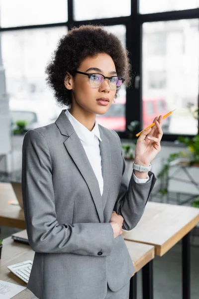 African American Businesswoman Formal Wear Holding Pencil — Stock Photo, Image