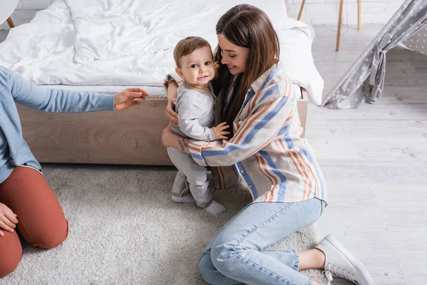 High Angle View Infant Boy Looking Camera While Hugging Happy — Stock Photo, Image