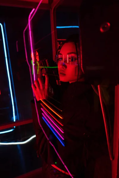 Armed Asian Killer Sunglasses Holding Gun Neon Lighting — Photo