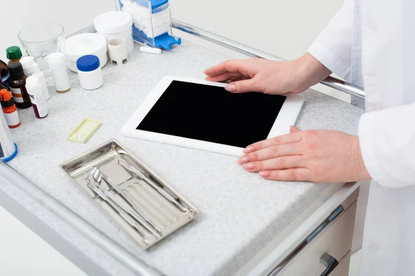 Cropped View Female Dentist Hands Using Tablet Blank Screen Metal — Stock Photo, Image