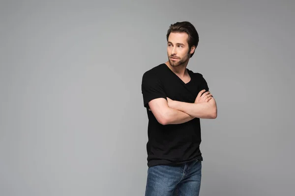 Young Bearded Man Black Shirt Posing Crossed Arms Isolated Gray — Stock Photo, Image