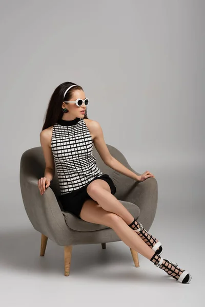 Young Pretty Woman Retro Outfit Sunglasses Sitting Armchair Grey — Stock Photo, Image