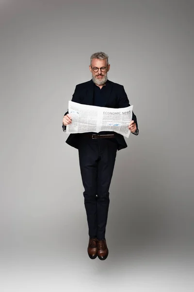 Full Length Middle Aged Businessman Glasses Suit Reading Economic News — Stock Photo, Image