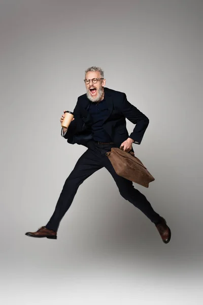 Full Length Excited Man Grey Hair Suit Holding Paper Cup — Stock Photo, Image