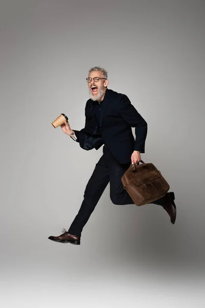 Full Length Amazed Man Grey Hair Holding Paper Cup Leather — Stock Photo, Image