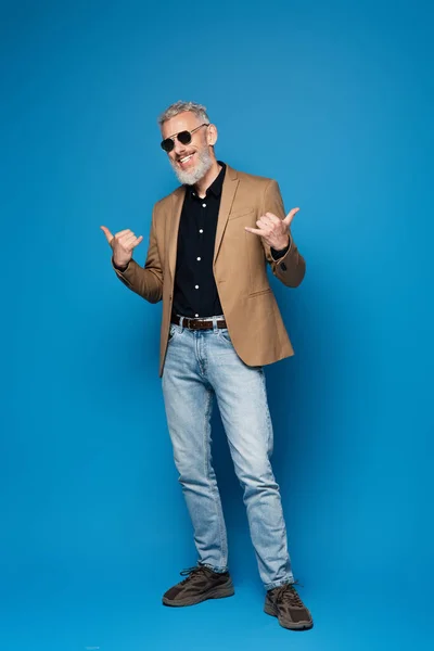 Full Length Cheerful Middle Aged Man Sunglasses Showing Call Gesture — Stock Photo, Image