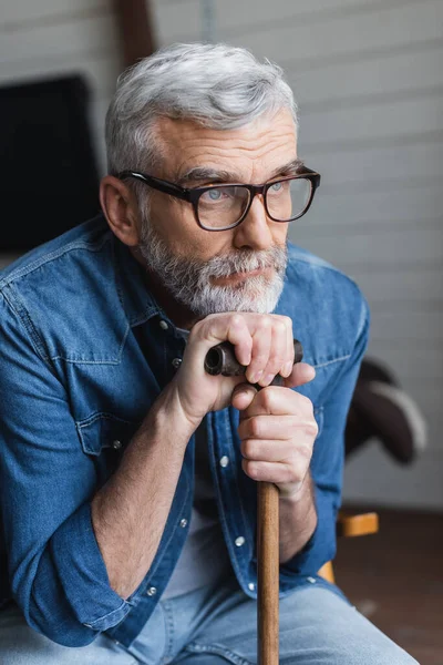 Elderly Man Eyeglasses Holding Crutch Home — Stockfoto