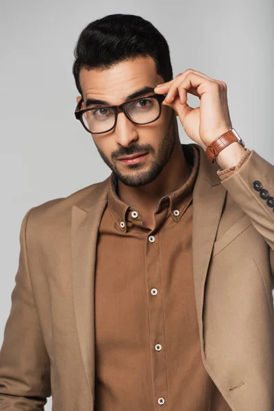 Arabian Businessman Holding Eyeglasses Looking Camera Isolated Grey — Zdjęcie stockowe