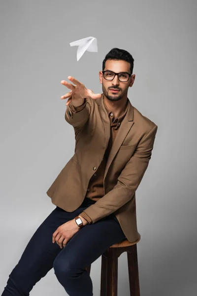 Arabian Businessman Throwing Paper Plane Isolated Grey — Stock Photo, Image